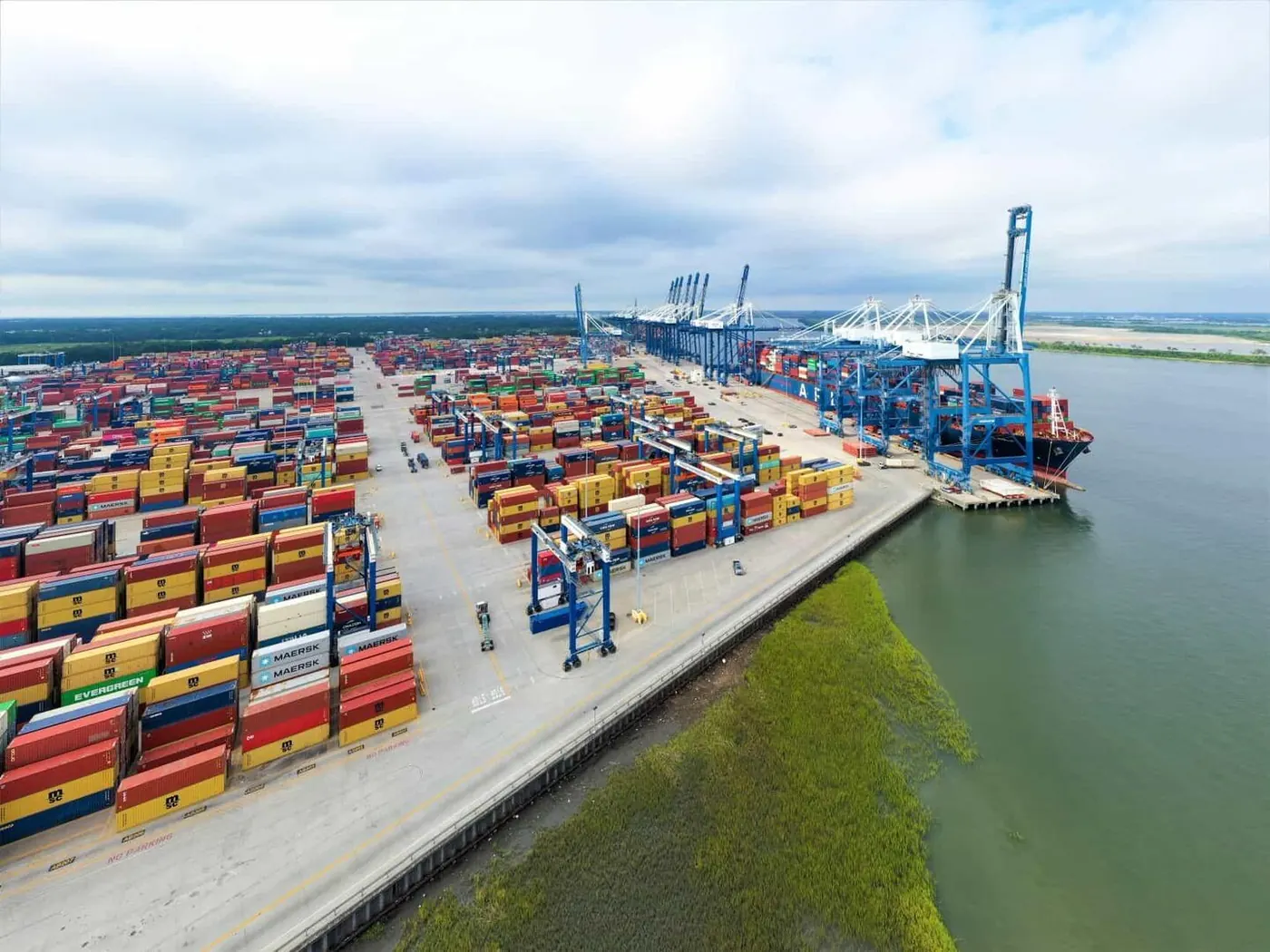 Aerial view of container terminal cranes and stacked containers at the Port of Charleston, South Carolina